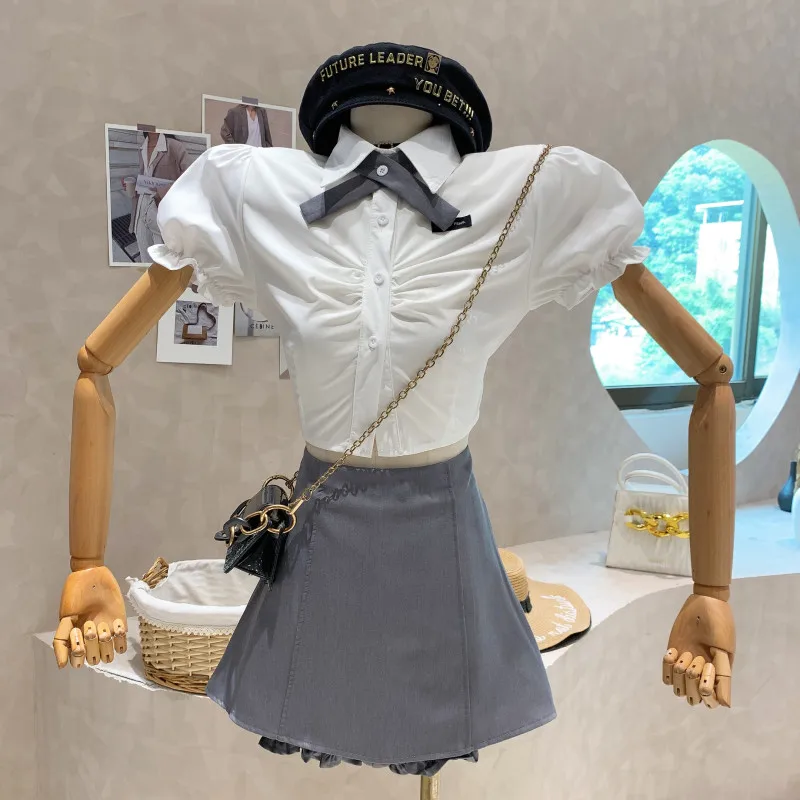 

Niche Design New Women's Clothing 2022 Summer College Style Lapel Fold Puff Sleeve Shirt Short Top Skirt Two Piece Set