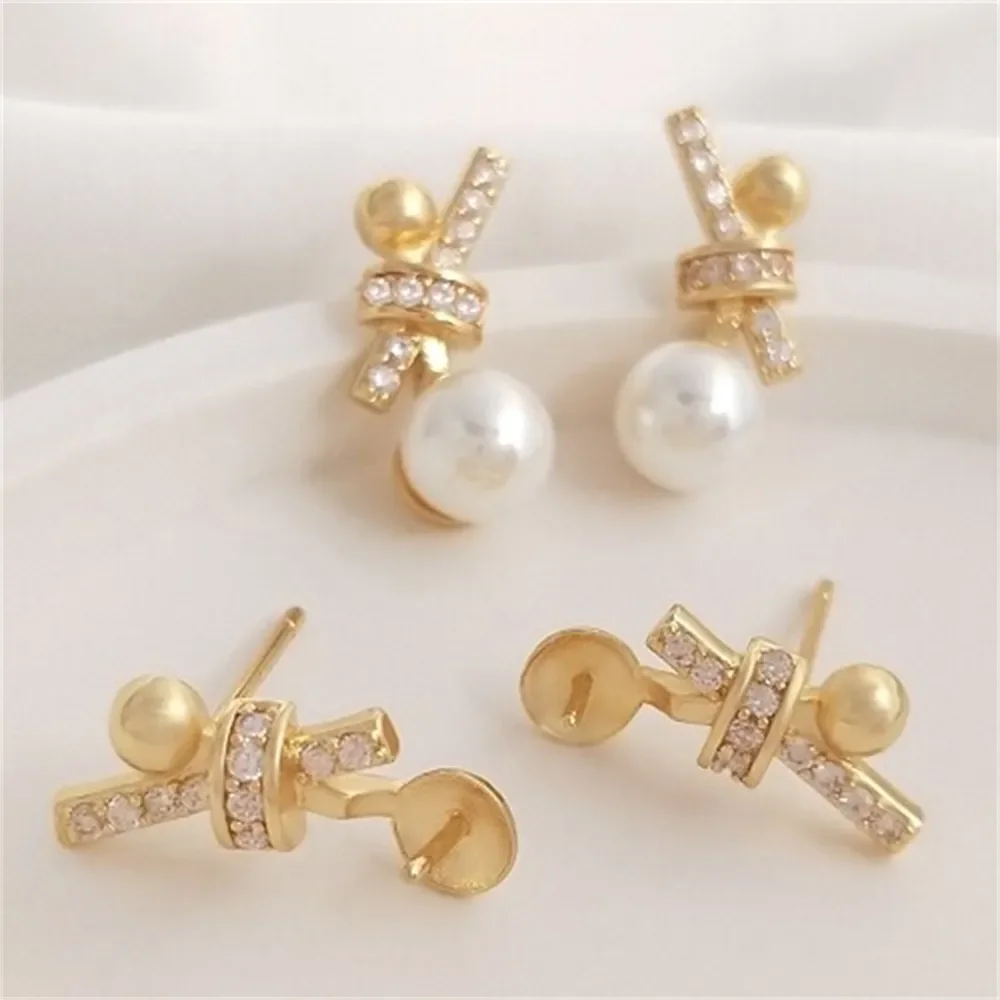 Серьги из бисера в форме банта с инкрустацией золотом 14 карат и цирконом серьги