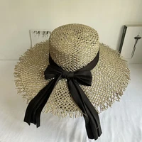 fashion big brim sea grass hand woven flat straw hats female hollow bow sun hat summer sunscreen beach hat