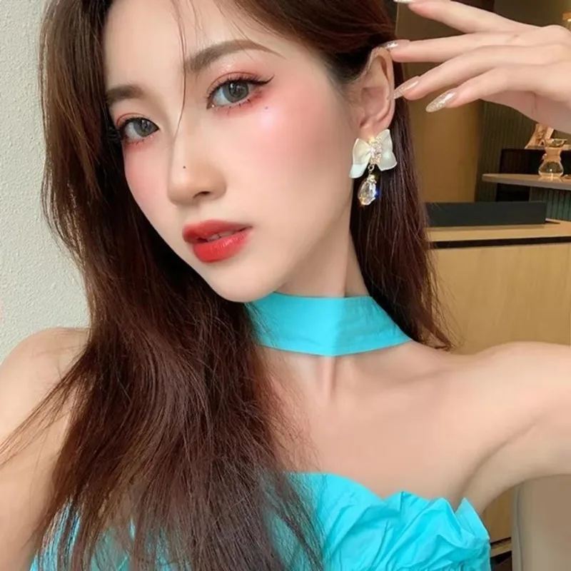 

S925 silver needle bow earrings crystal earrings temperament goddess fan net red earrings popular niche design stud earrings