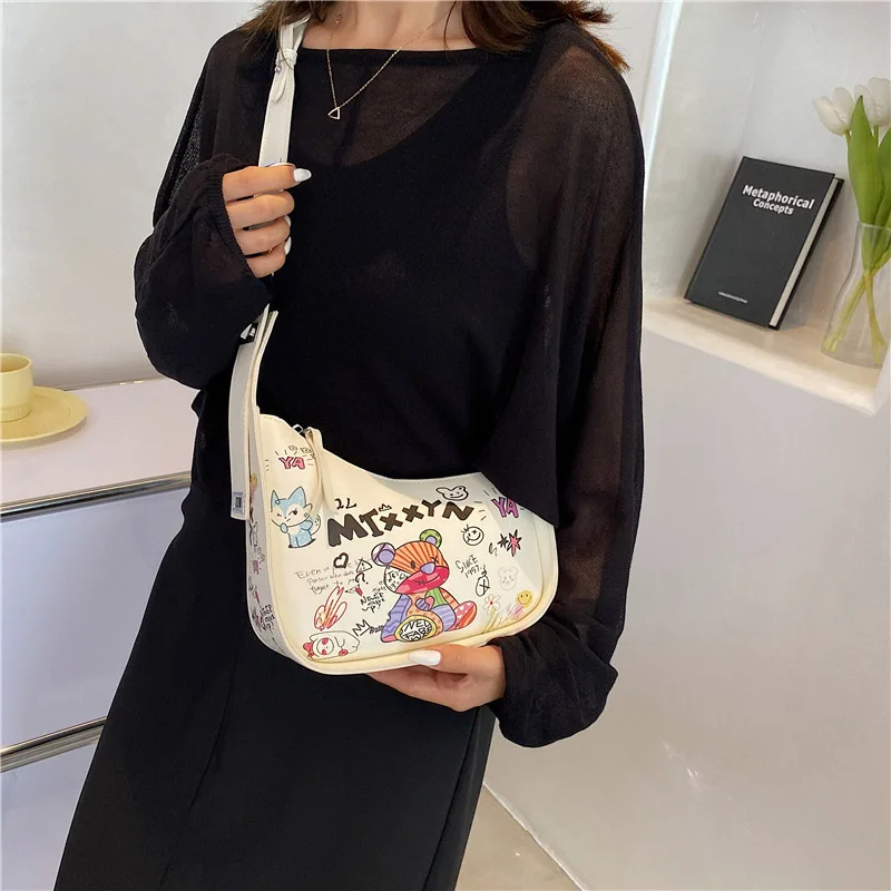 

2023 Fashion Cartoon Graffiti PU Leather Armpit Shoulder Bags For Women New Women's Designer Crossbody Bag Luxury Brand Handbag