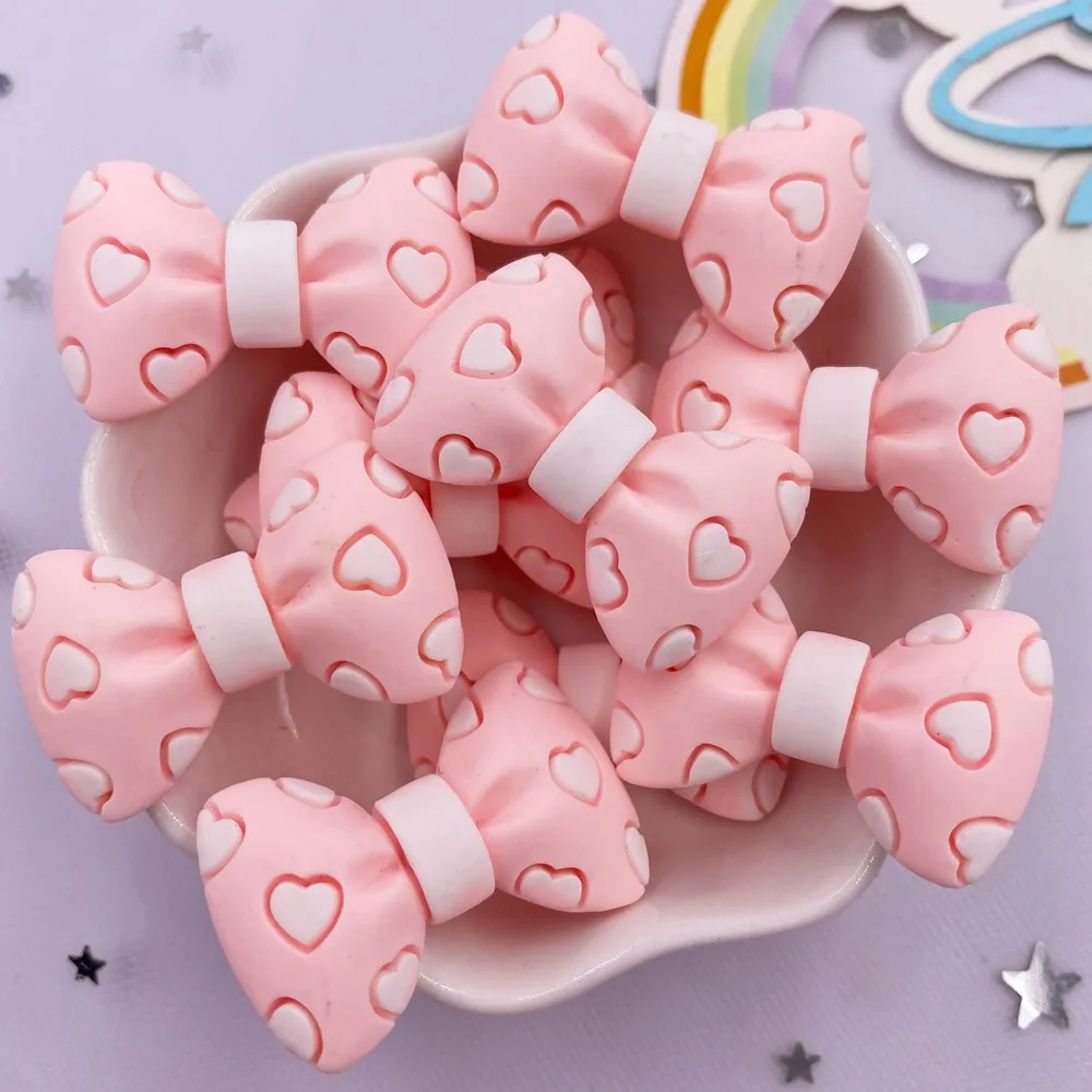 

Фигурки из смолы сердечки с бантами 10 шт