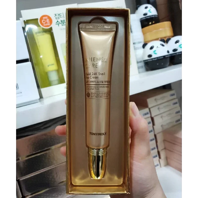Фото Korea Tonymoly Intense Care Gold 24K крем для глаз с улиткой 30 мл против морщин, отбеливание, увлажняющий, питательный, антивозрастной уход за кожей №1
