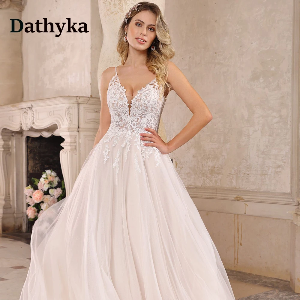

Dathyka Charmin V-Neck Backless Wedding Dresses For Women Lace Appliques Pearl Spaghetti Strap Long Vestidos De Novia Brautmode