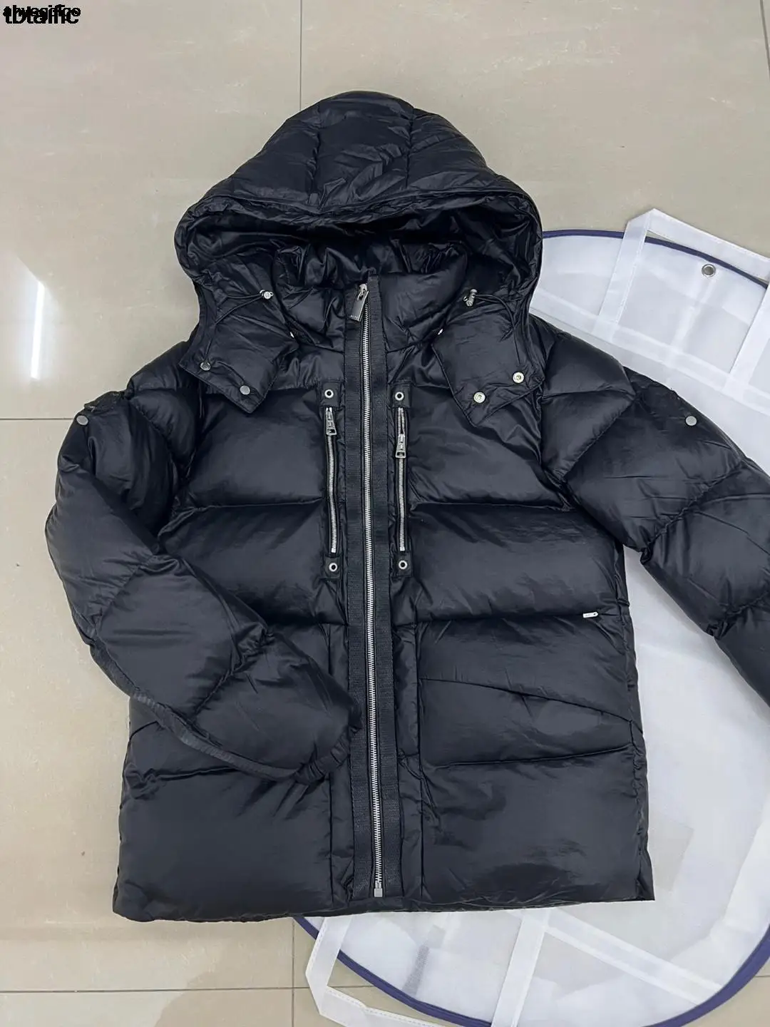 Рисунок 3 - Высококачественный мужской зимний пуховик 2023 года