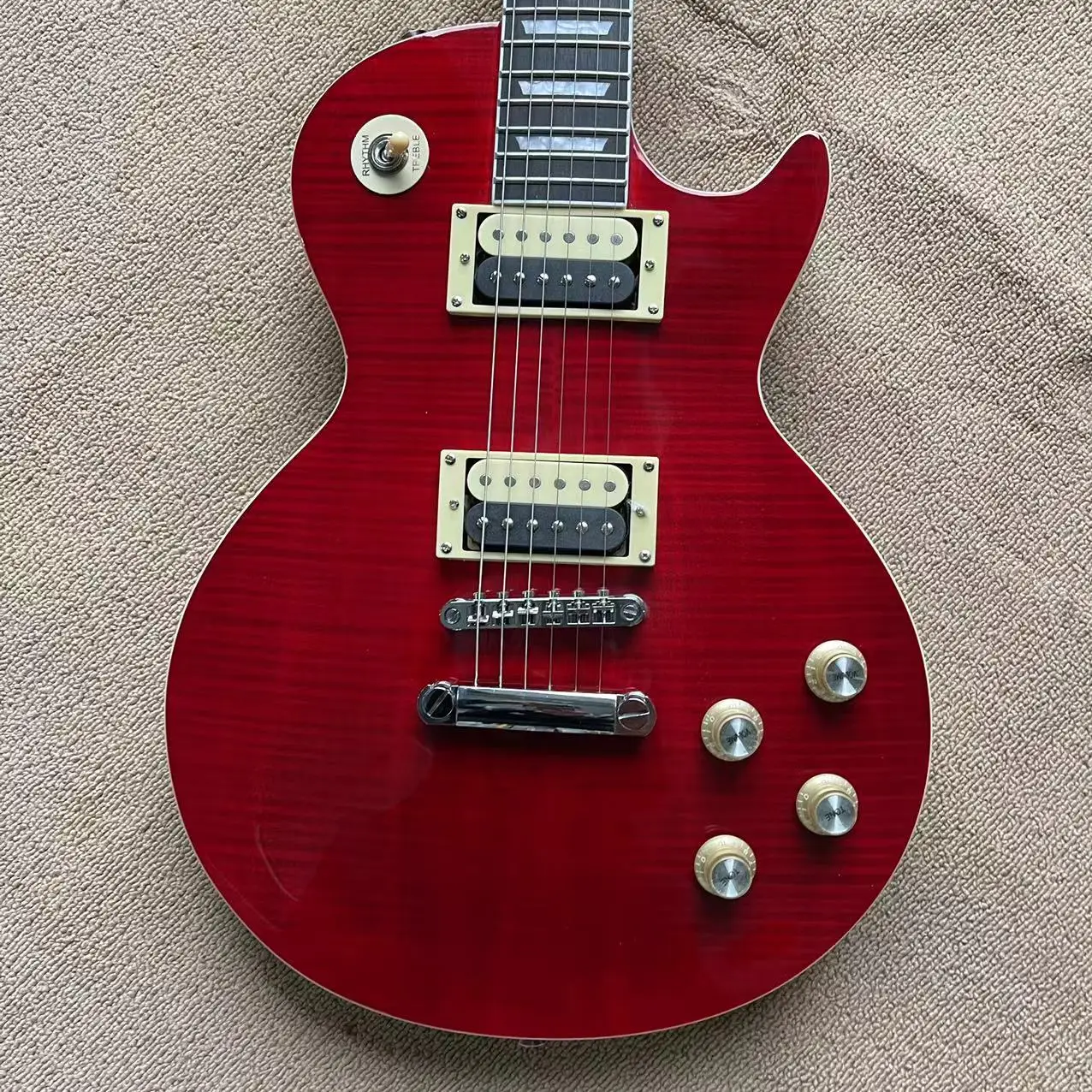 

LP all-in-one electric guitar, transparent red cross grain veneer mahogany body, zebra pickup, LP string bridge, rosewood finger