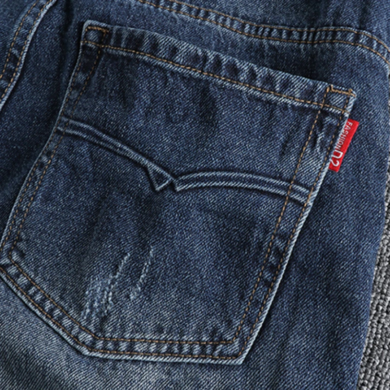 Impressed pattern heavy retro trend high street jeans men have to make old holes patch young daddy pants.