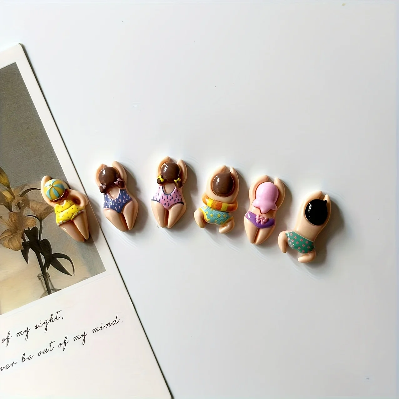 

Магниты на холодильник "Плавающие люди"