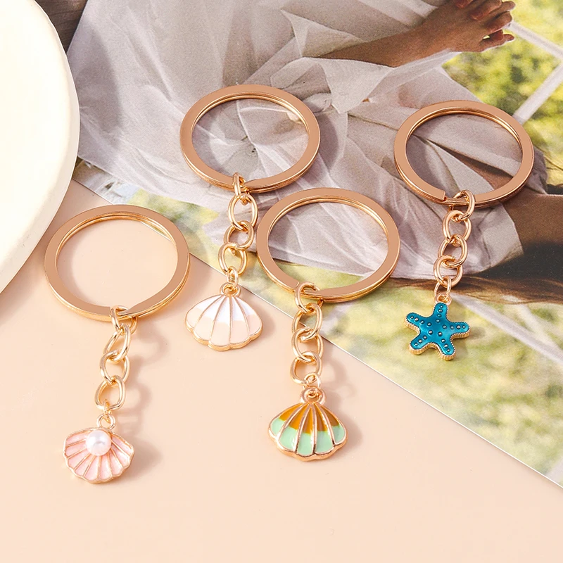 

Lovely Shell Starfish Keychain Enamel Pearl Key Rings Summer Beach Key Chains for Women Girls Handbag Accessorie DIY Jewelry