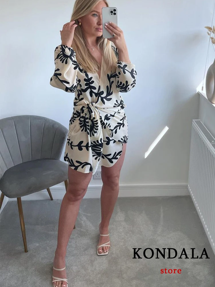 

Винтажное платье-мини KONDALA с цветочным принтом и поясом, женское атласное модное платье с длинным рукавом и V-образным вырезом, элегантное пл...