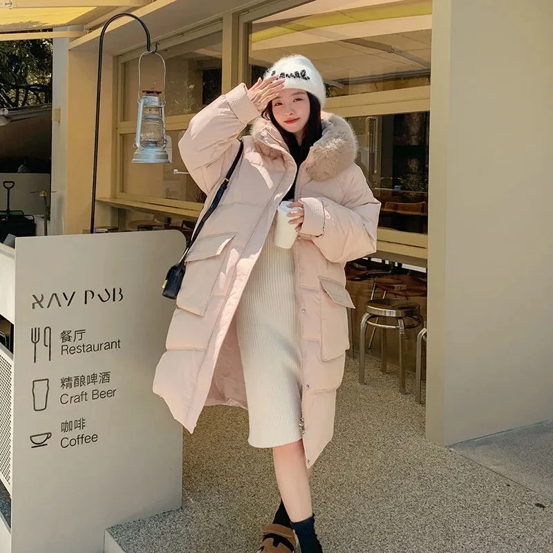 Женская длинная стеганая куртка с меховым воротником и капюшоном теплая зимняя