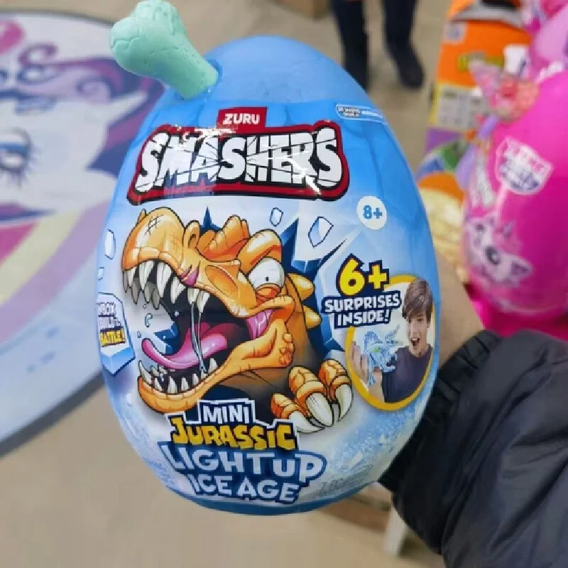 Фото Игрушка-яйцо Zuru Smashers Mini Glacier Dinosaur Escape: Тираннозавр Рекс, светящаяся фигурка-пазл, коллекционная, подарок на день рождения №3
