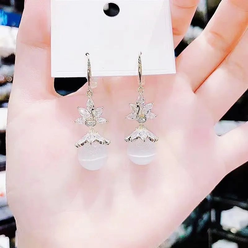 

2022 new trendy Korean temperament personality cat eye earrings fashion all-match net red super fairy earrings ear hook earrings