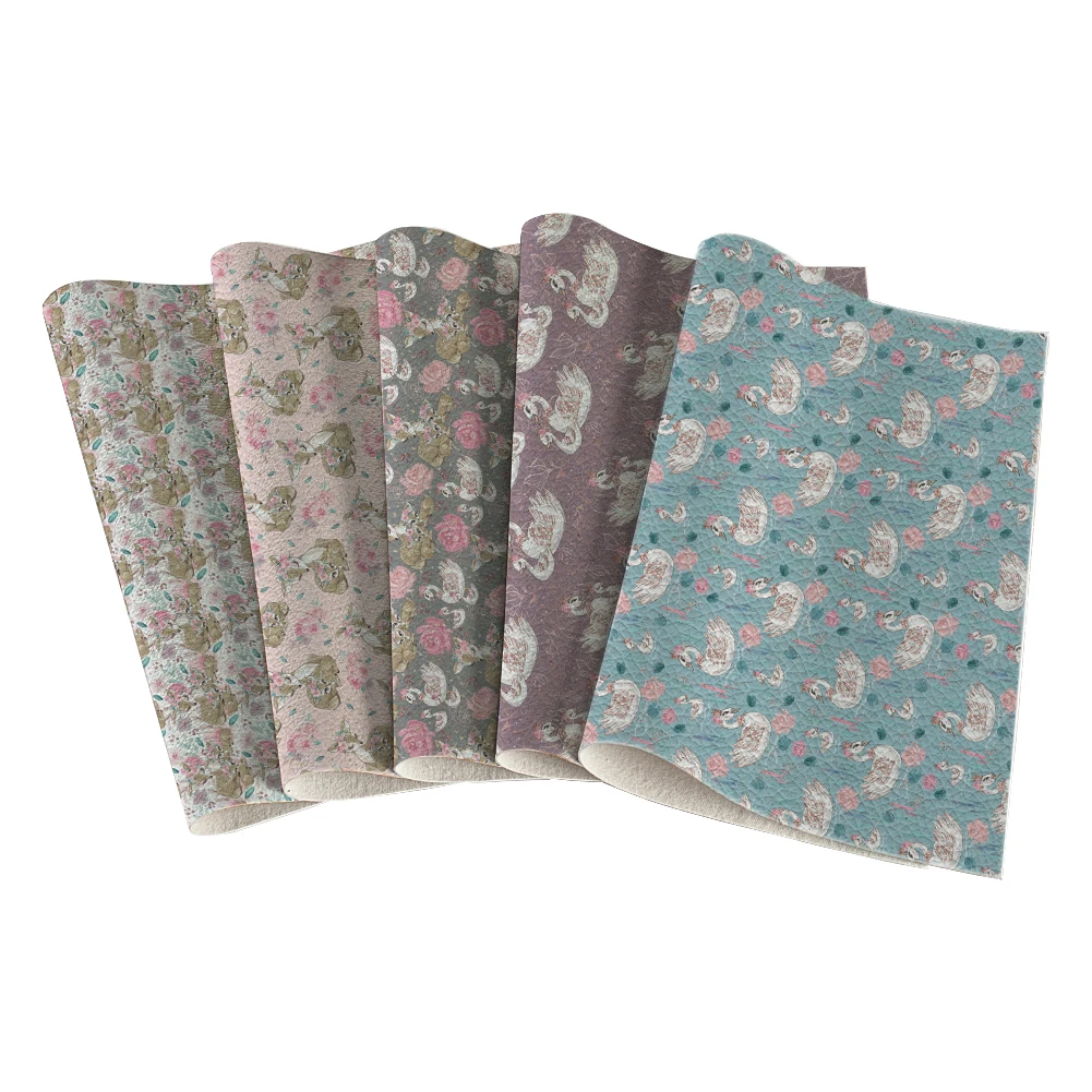 

Cartoon Theme of Cute Deer and Beautiful Swan Pattern Lychee Faux Suede PU Leather Fabric for DIY Hair Bow Handbags 30X136CM
