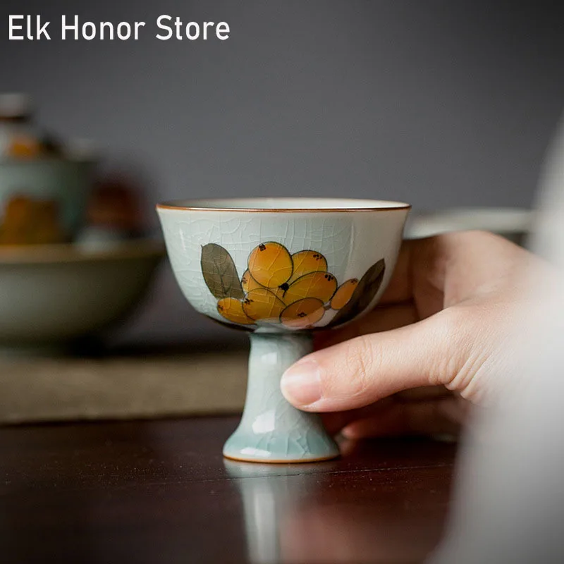 

2pc/set 70ml Boutique Pure Hand Painted Loquat Art Ceramic High Foot Tea Cups Household Ice Cracked Glaze Master Cups Tea Set