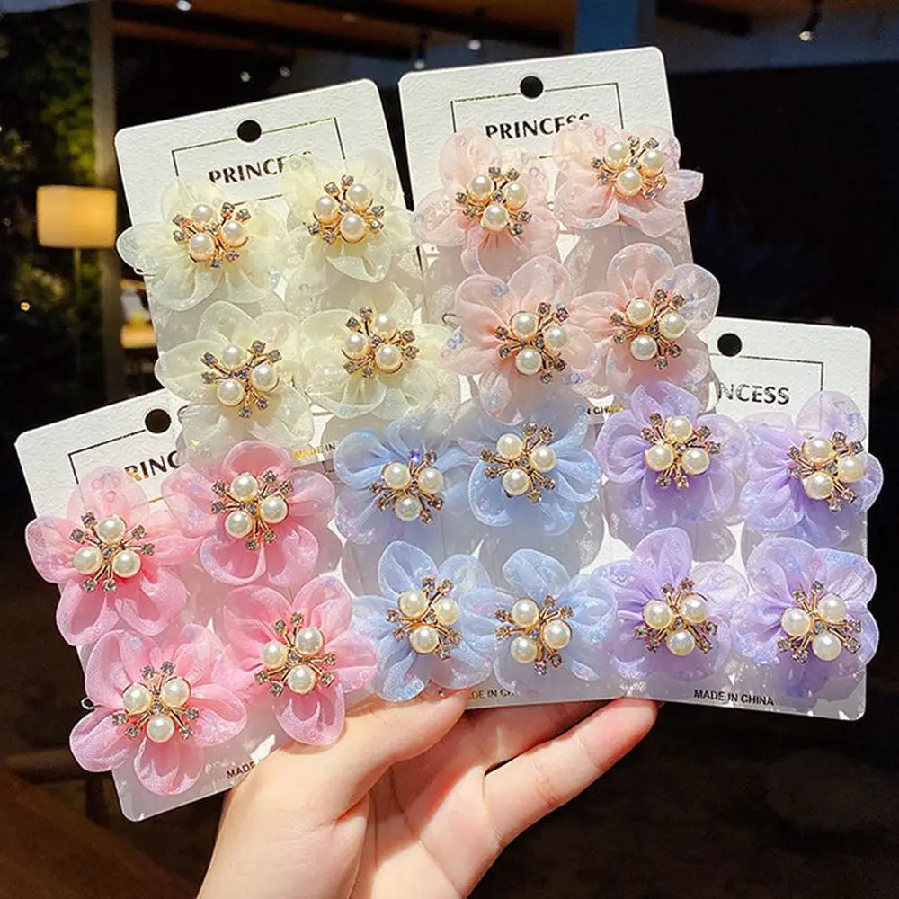 

2 шт./компл. детские заколки для волос с жемчугом и цветком, милые детские плетеные заколки для волос в стиле принцессы, инструменты для уклад...