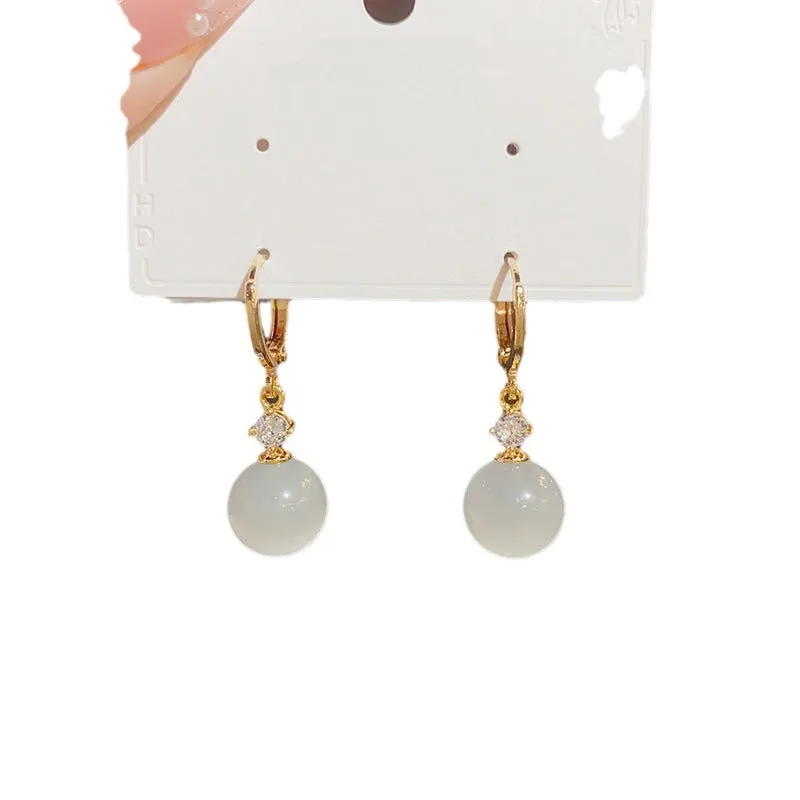 Индивидуальные простые женские серьги-подвески в виде кошачьего глаза с