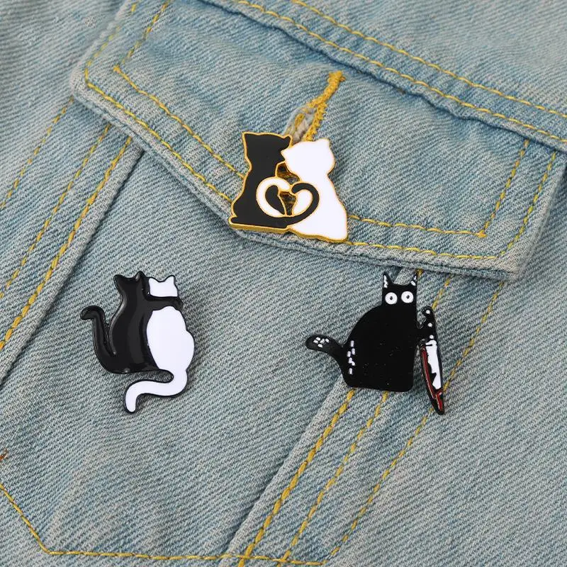10 PCS / LOT Cat lovers Enamel Pin Custom Black and White Cat Love Tail Dagger Brooches Bag Lapel Pin Gothic Badges Jewelry