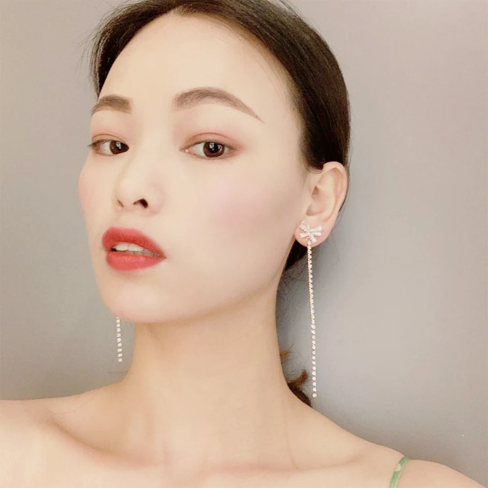 

Korean Fashion Bowknot Earrings Luxury Shiny Zircon Long Tassel Drop Earrings for Women Wedding Charm Ear Studs Jewelry
