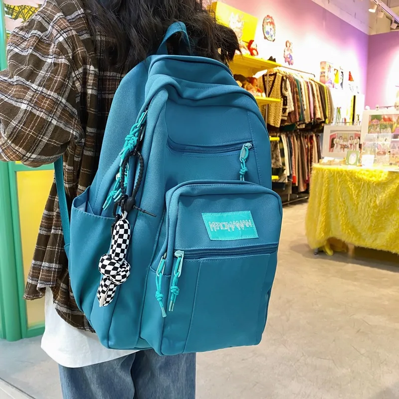 

Unisex Waterproof Nylon Backpack Fashion Vertical Zipper Travel Bag for College Couples Schoolbag Men and Women Laptop Backpack