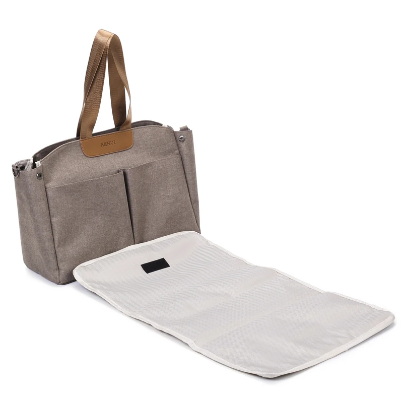 Przenośna wielofunkcyjna torba na pieluchy z zamkiem błyskawicznym i dużą pojemnością dla niemowląt marki Upnzt