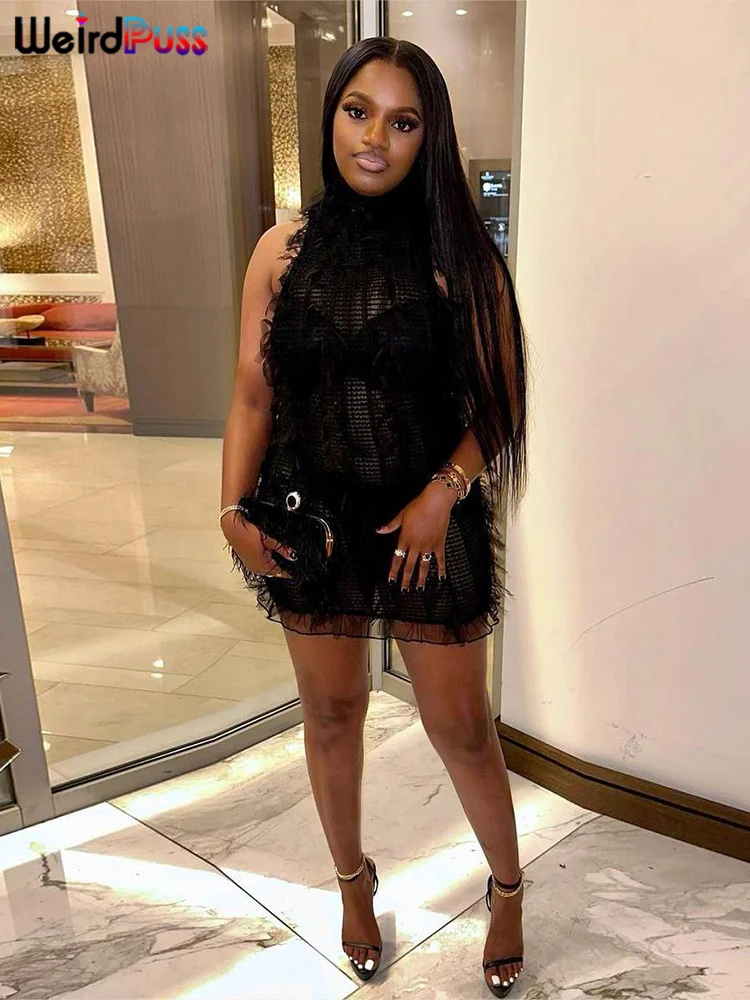 Женское трикотажное платье с бахромой