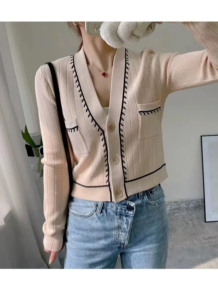 

2022 Clash-colored Open Thread Halter Belt V-neck Cardigan A-line Half Skirt Knitting Set Women Sweater