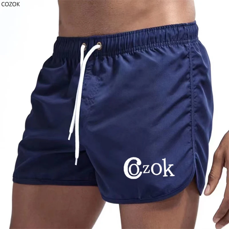 

Men's summer Sports Shorts Casual Beach Sportswear Jogging Swimming Surfing Fitness Shorts Quick Dry Printed