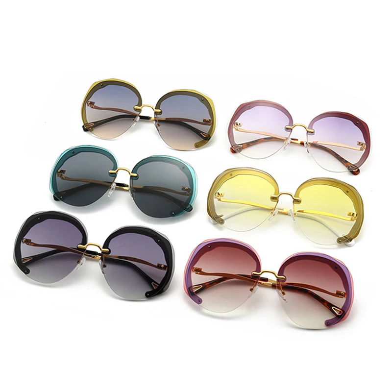 

Модные большие круглые женские солнцезащитные очки без оправы из сплава кошачий глаз с прозрачными океанскими градиентными линзами UV400 трендовые мужские солнцезащитные очки