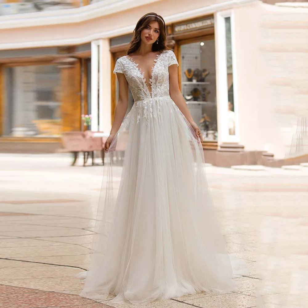 

Pastoral Bridal Gowns Lace Appliques Beaded Tulle A-Line Bride Dress 2022 New Sexy Deep V-Neck Backless Cap Sleeve Wedding Dress