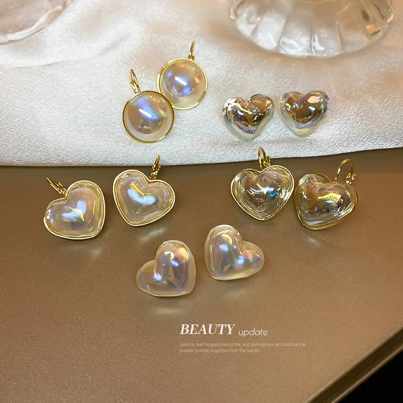 

Silver Needle Mermaid Pearl Love Earrings Korean Fashion Simple High Sense Temperament Light Luxury Lady