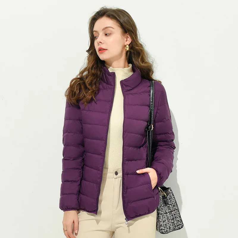 

Autumn and winter women's down jacket 90% light down jacket solid color all-match stand collar pie to overcome slim top coat