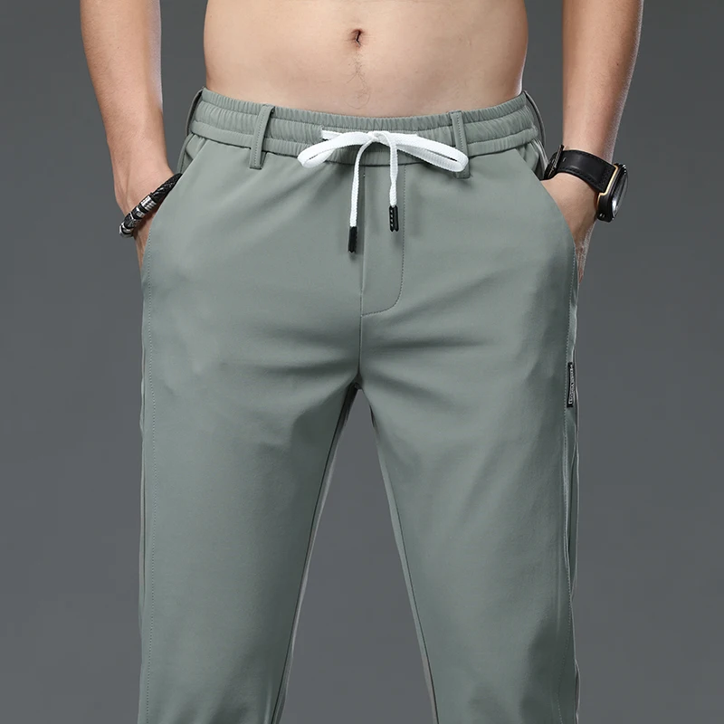 

Men's Trousers Spring Summer New Thin Casual Men Pants Green Solid Color Fashion Pocket Applique Full Length Joggers Pantalon