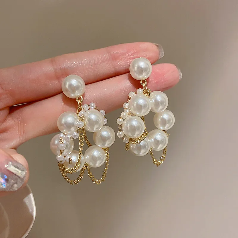 

Серьги-подвески женские круглые с искусственным жемчугом