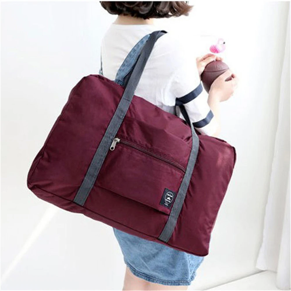 

2022 Nylon Foldable Travel Bags Unisex Large Capacity Bag Luggage Women WaterProof Handbags Men Travel Bags Clothing Organizer