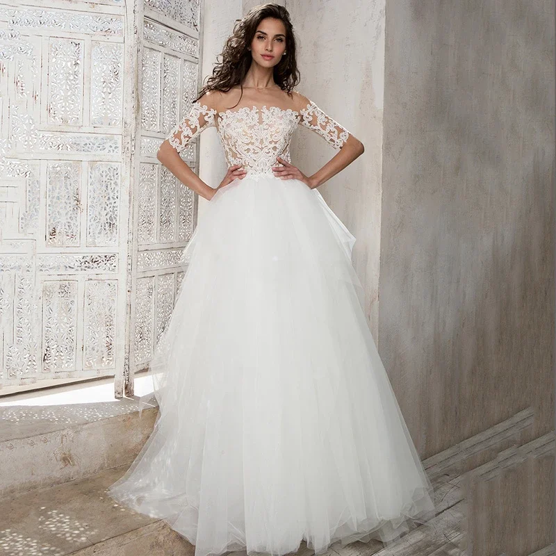 

Elegant A-Line Wedding Dress Boat Neck Lace Appliqued Half Sleeves Backless Bridal Gown Tiered Ruffles Tulle Vestidos De Novia