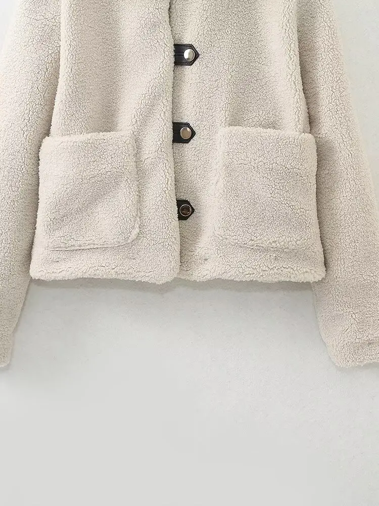 Женское однобортное пальто с отложным воротником длинными рукавами и карманами