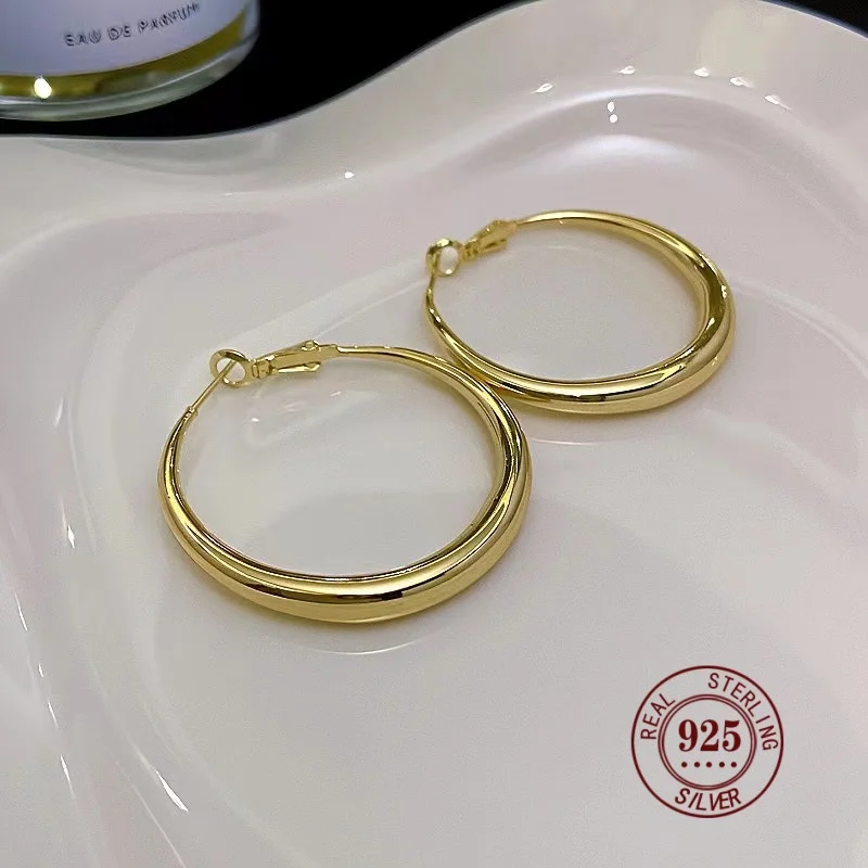 Женские серьги-кольца из серебра 925 пробы 18 к