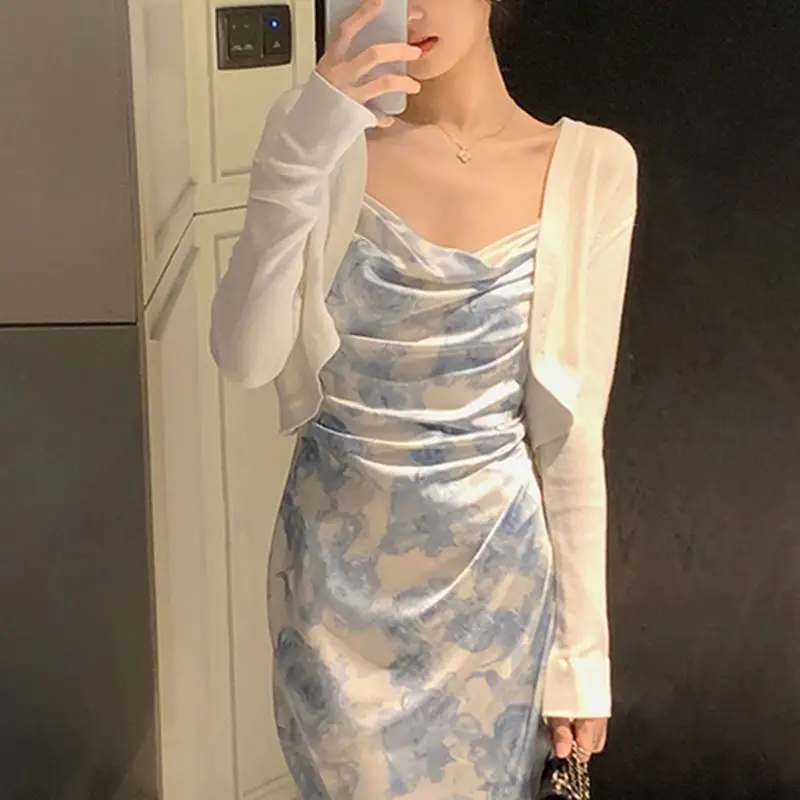 

2023 Summer New French Pleated Waist Wrapped Blue Wrapped Hip Fragmented Flower Strap Dress Women's Mid Length Dress Trend