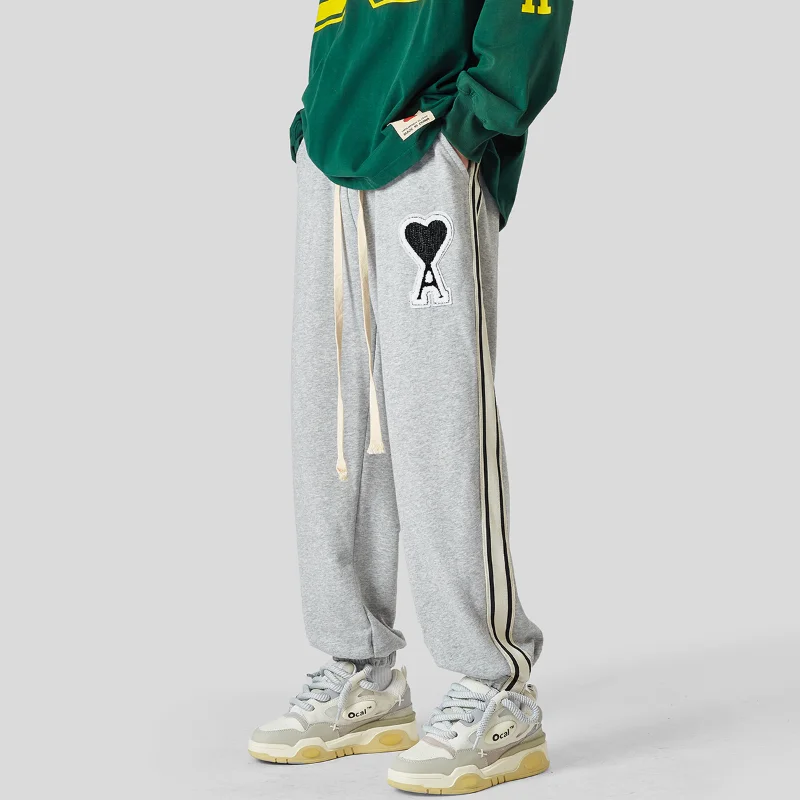 

Men's Classic Versatile Comfortable Sports Casual Pants New Loose Pattern Printed Pants M-3XL