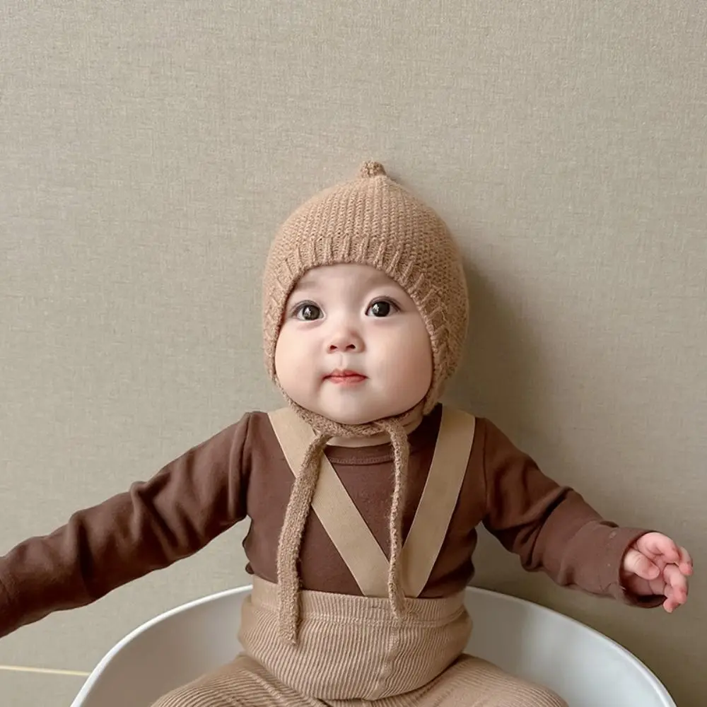 Мягкая однотонная детская вязаная шапка головной убор сохраняющая тепло