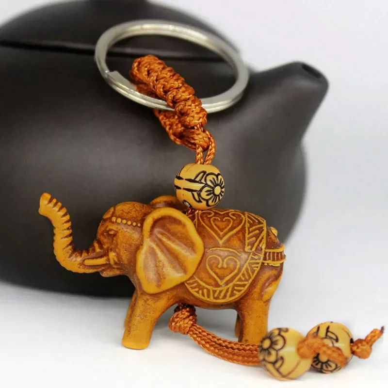 PCS Elephant Keychain Peach Wood Carving Unique Key Chain To Give Gifts  Pom Pom Cute Keychain  Stainless Steel