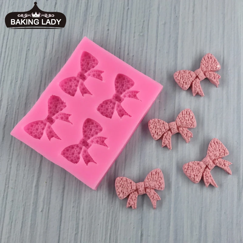 

MNYB New 4 even bow-shaped cake silicone mold handmade DIY Clay Resin Art chocolate fondant mold Cake Decoration Tools