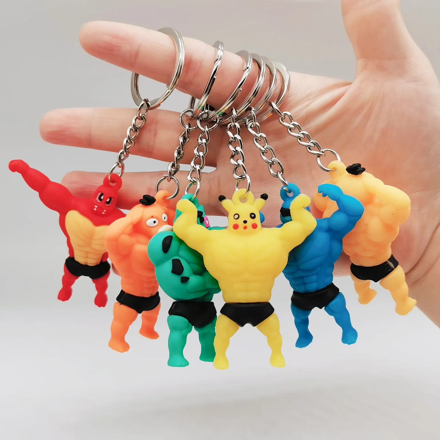 

New Hot Sale Pokemon Muscle Pikachu Keychain Pendant Creative Explosion Squirtle Charmander Action Figures Series Keychain