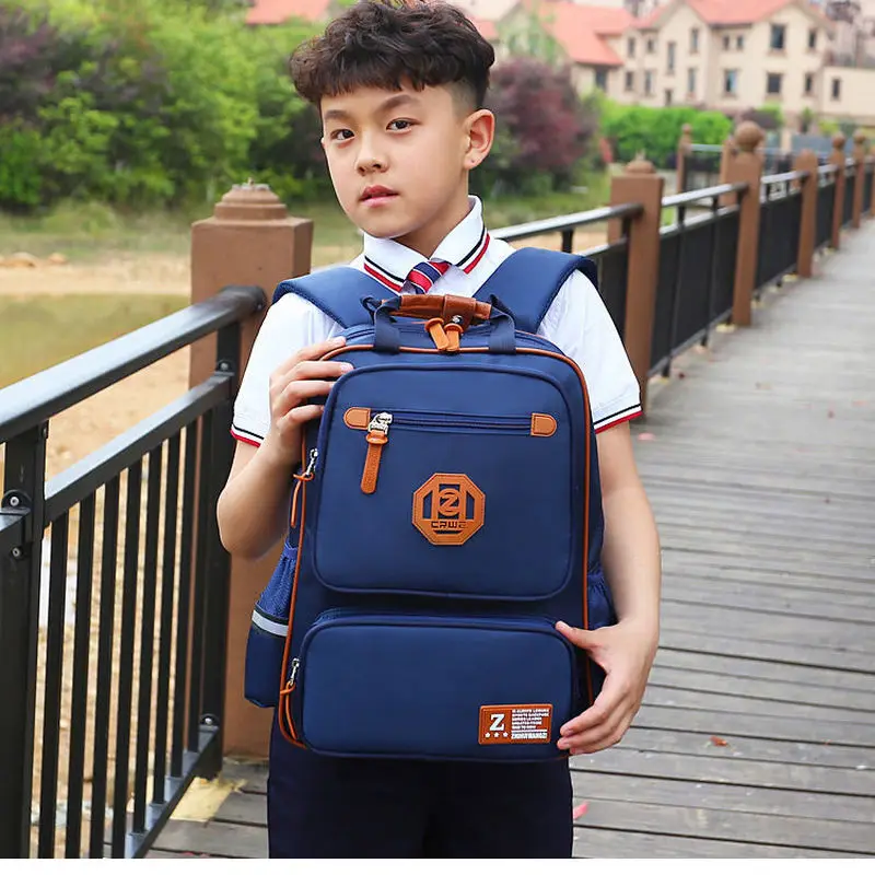 Kids School Bags for Boys Primary School Orthopedic Backpacks Child Waterproof Nylon Schoolbag Bookbags Solid Big Capacity