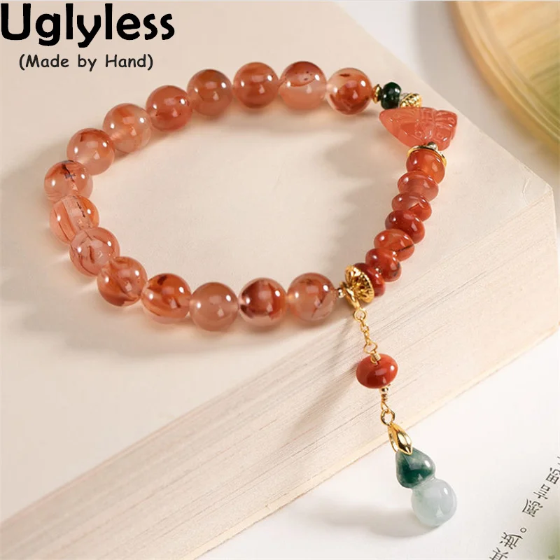 

Uglyless Like Transparent Glass Nature Cherry Agate Bracelets for Women Agate Butterfly Fashion Bracelet 925 Silver Elastic Rope