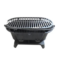 cast iron hibachi barbecue with wood or coal fuel