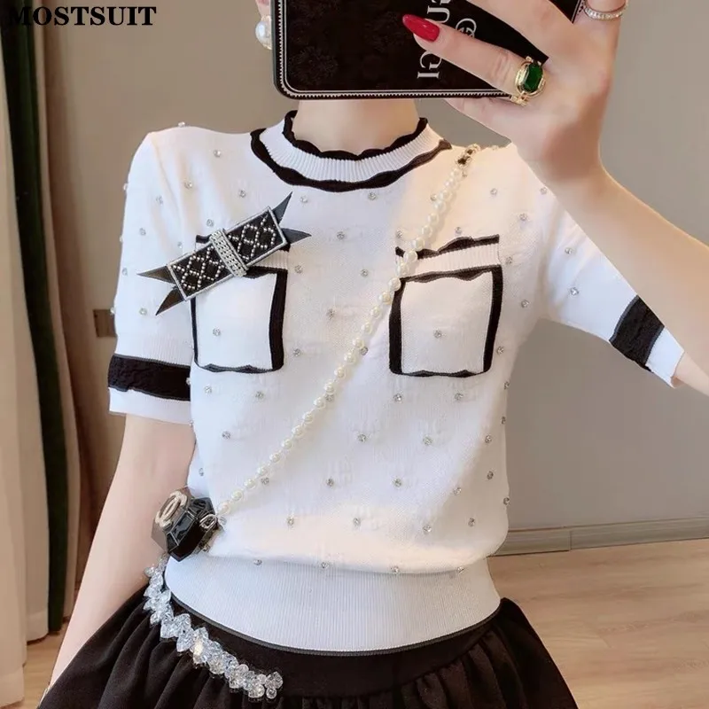 

Женский трикотажный пуловер с круглым вырезом, коротким рукавом и карманами