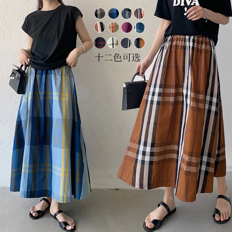 Женская клетчатая юбка миди универсальная модная трапециевидная весна-лето 2023