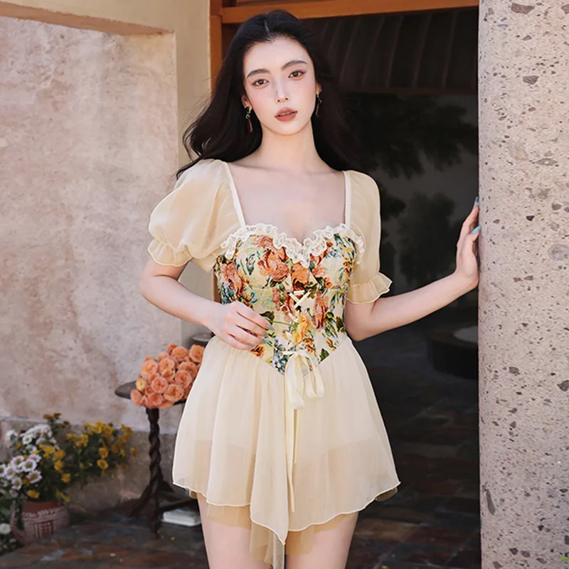 

2023 New Women's Swimwear Hot Spring Conservative Print Fairy Style Sexy Open Back Covering Belly Slim Skirt One Piece Swimsuit